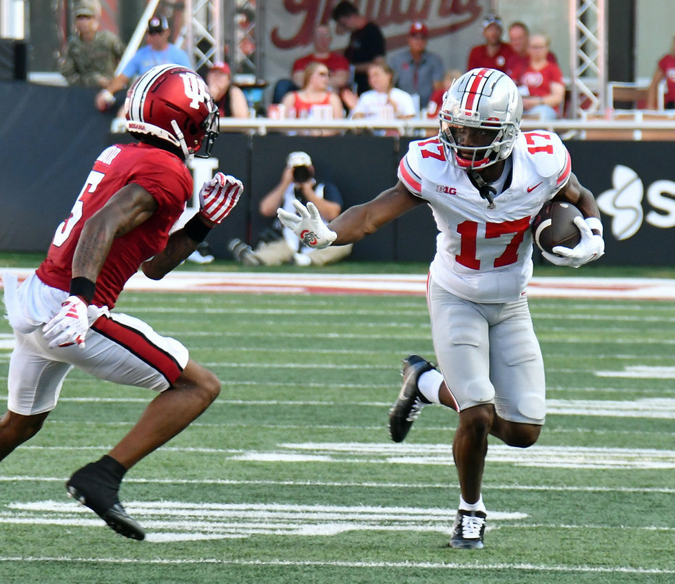 Carnell Tate running after the catch in a game against Indiana last November