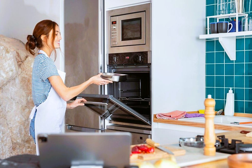 A woman preparing food on her kitchen