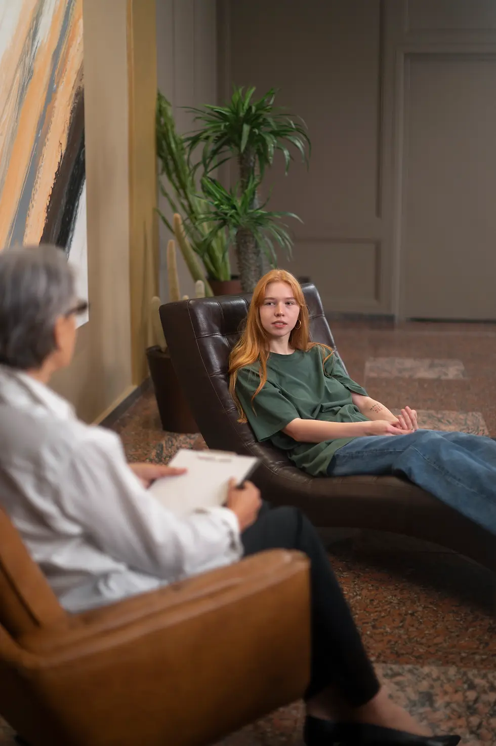 authentic-scene-young-person-undergoing-psychological-therapy