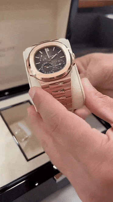 1R-001 Nautilus Moon Phase in Rose Gold with Sunburst Dial Unboxing (1).gif