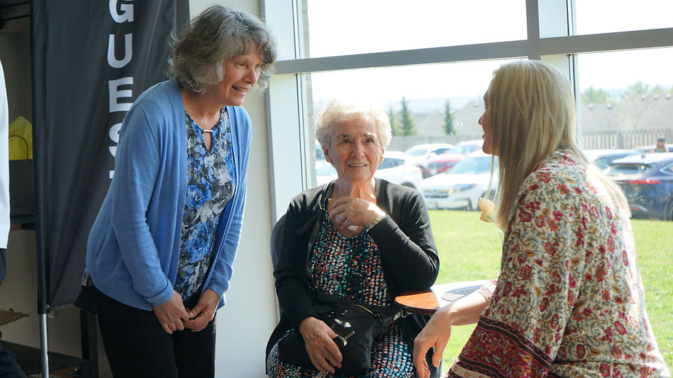 Three ladies talking at church