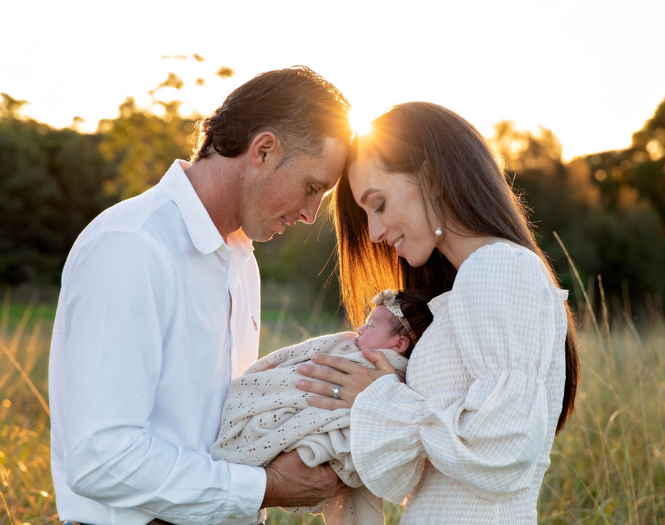 Sydney mum, dad and baby photo outdoors at sunset