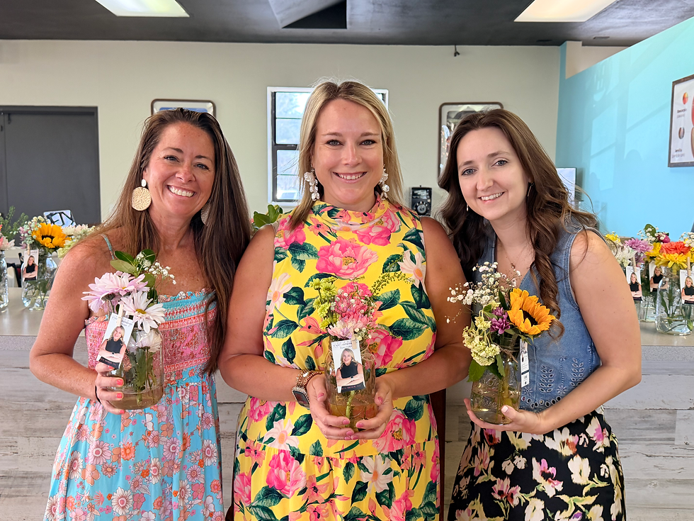 Tarra Meadows of Clear Choice Title, Local Connections Volusia founder Kalie Luckenbaugh, and community collaborator Lindsay Ackerman.