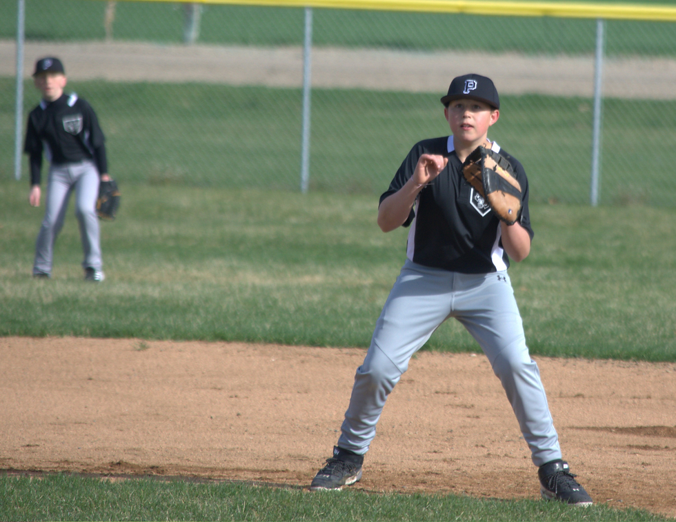 Hunter Mitchell readies to make a play for Parma Middle School in 2024.