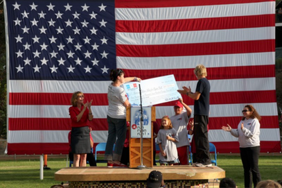 Man receiving a donation - The Lighthouse Project