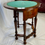 Thumbnail: Small Victorian figured walnut demi-lune card table in the George I manner