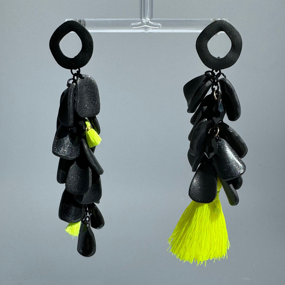 Grapes Black Asym Earrings Bijoux Vii Mykonos Collection, neon green tassels, black Swarovski, on the earrings stand