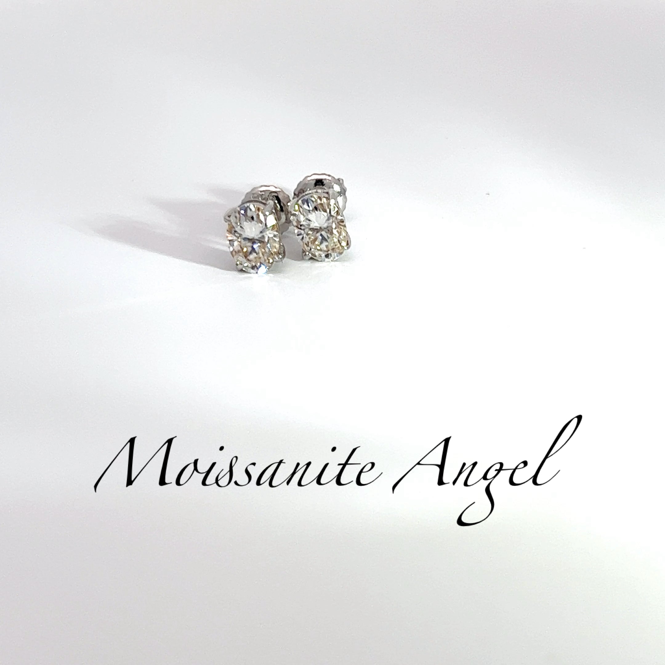 2 CTW Oval-Cut Moissanite Studs — 6.5mm