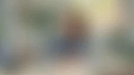 A man sitting in an office creating social media influencer marketing content