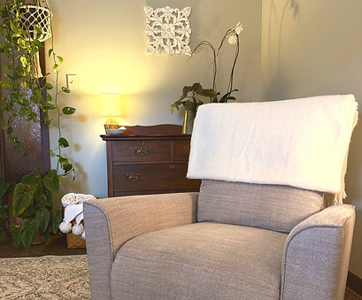 Cozy therapy chair at True Worth Therapist in Brookfield Wisconsin where clients exploring identity self-esteem and life transitions feel safe to show up as they are