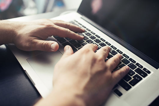 mans-hands-on-laptop-business-man-work-o