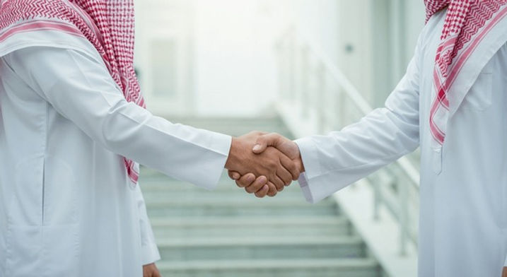 businessman-arab-shake-hands-against-600nw-2651861809.jpg