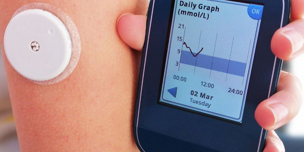 Close-up view of a continuous glucose monitor sensor attached to the upper arm
