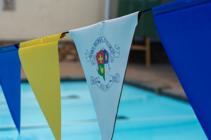 An image of swimming pool flags at Loreto Queenswood.