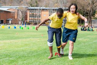 An image of two learners doing a fun run.