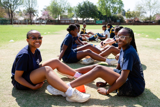 Grade 7 learners enjoying an outdoor Physical Education session.