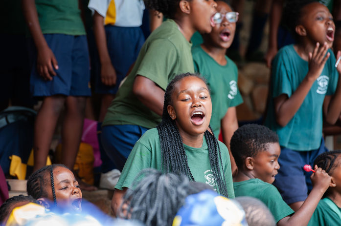 A learner cheering on at a swimming gala at a school near Steve Biko hospital.
