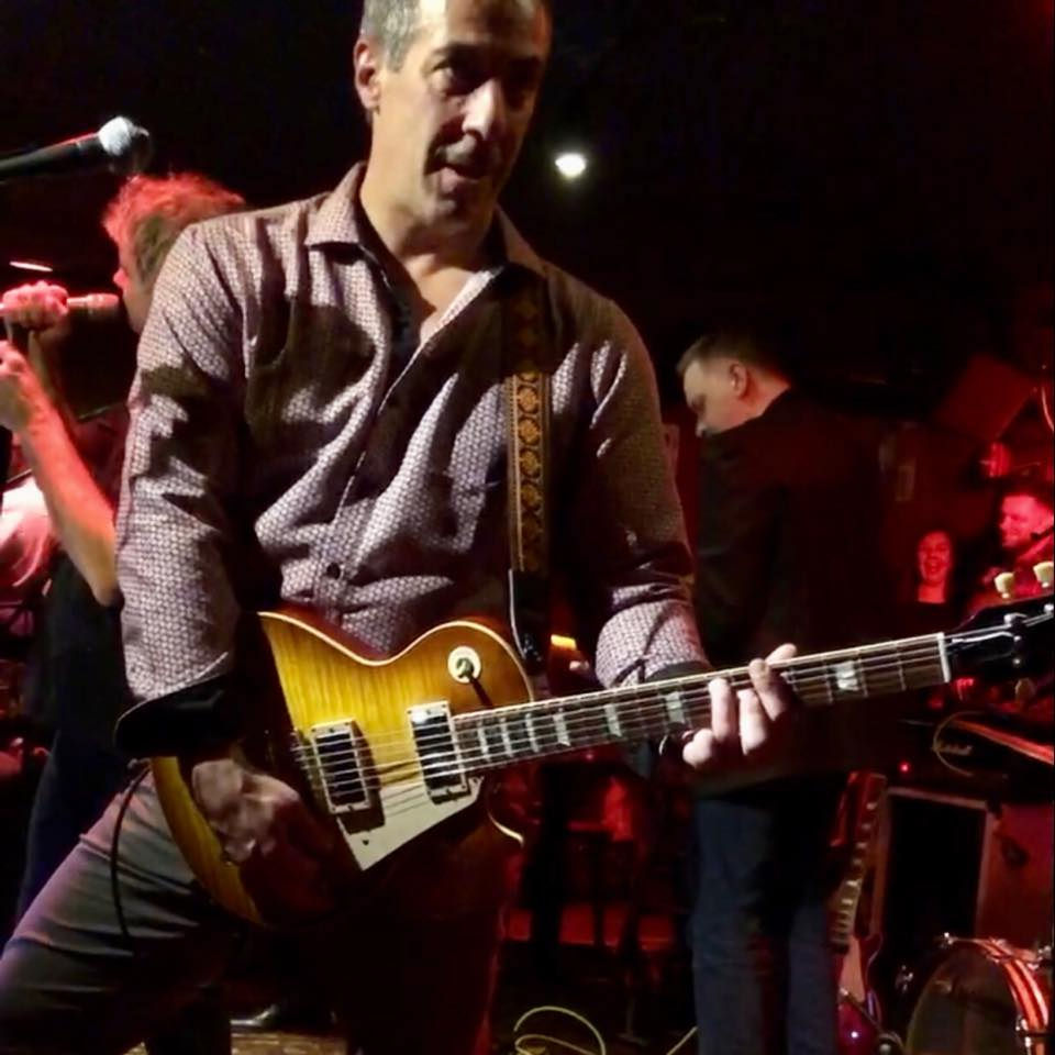 Electric guitar performance on stage