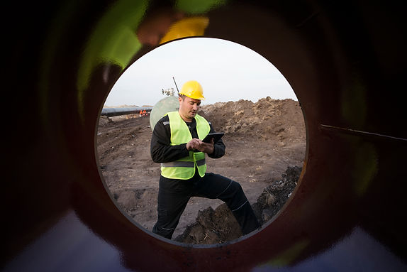 plumber checks a blocked drain with a camera