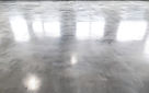 Shiny blue and grey epoxy coated concrete floor