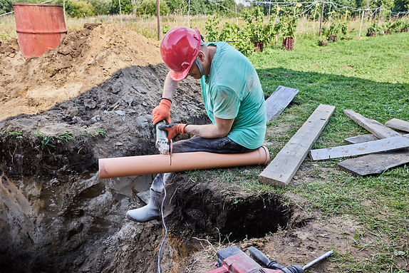 plumber install underground pipes for water