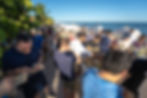 Eye-level view of a picnic table laid out with food and drinks