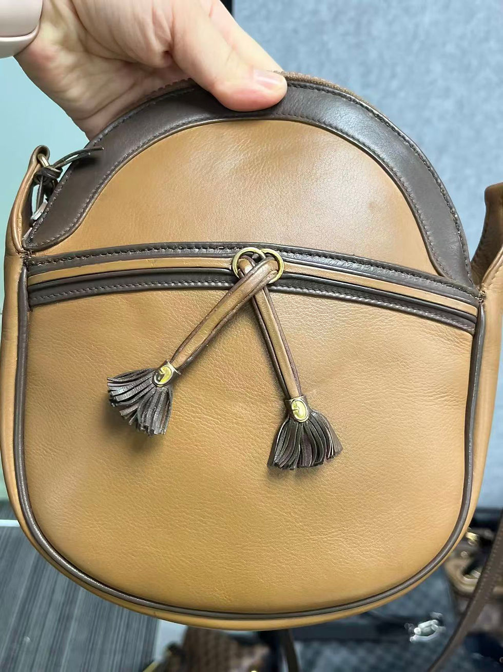 Thumbnail: Gucci Vintage Tassel Oval Crossbody Bag