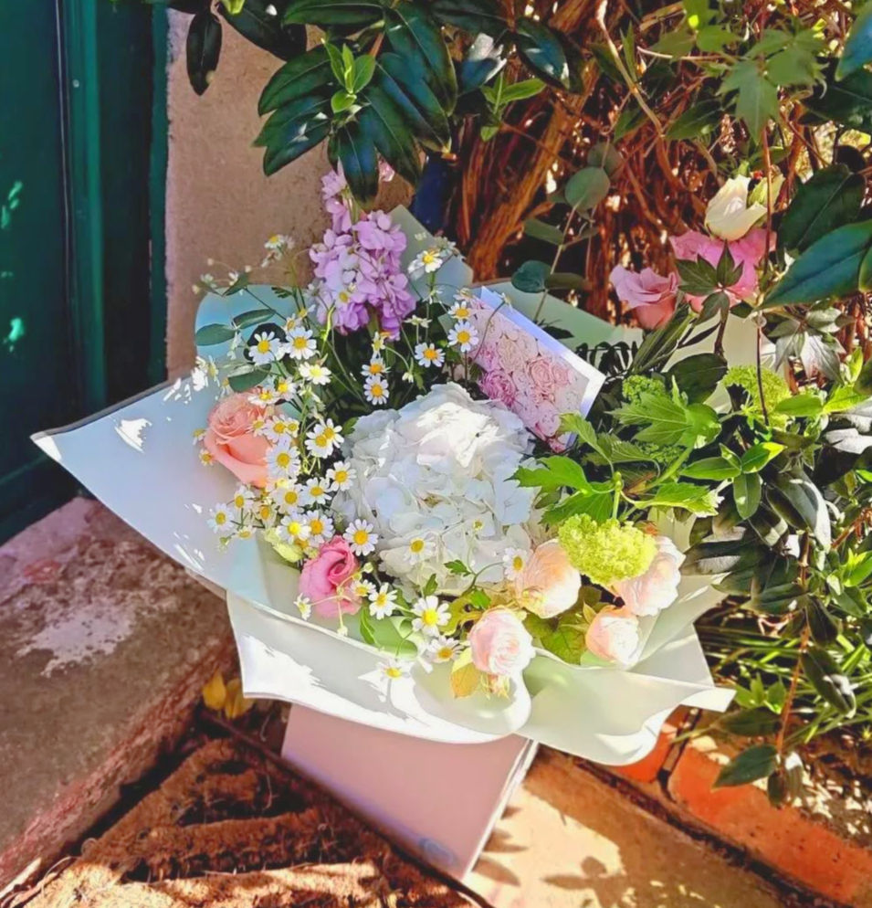 Thumbnail: Signature hydrangea hand tied bouquets - from £35