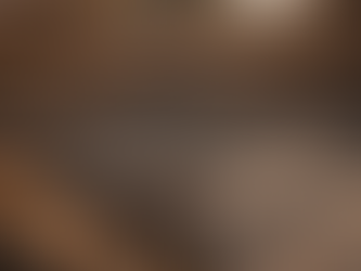 Construction foundation with rebar grid and wooden formwork set in excavated soil, preparing for a concrete pour.