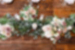 Reception flowers by Studio Bloom at Wilsons Ciderhouse in Iowa City