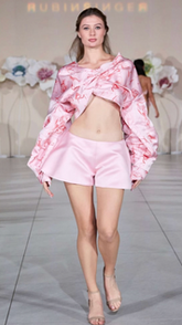 Satori model on a luxury fashion runway in Miami.