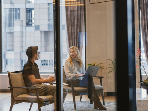 Models interacting in modern office setting at Willis Tower during digital advertising campaign in Chicago
