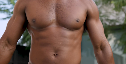 a close up of a man 's chest and stomach