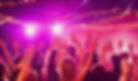 wedding dance party lots of people with arms in air dj lights orange and pink_edited_edite