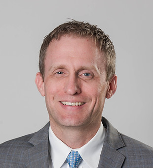 Brian Slusarz_Headshot Cor Deo.jpg