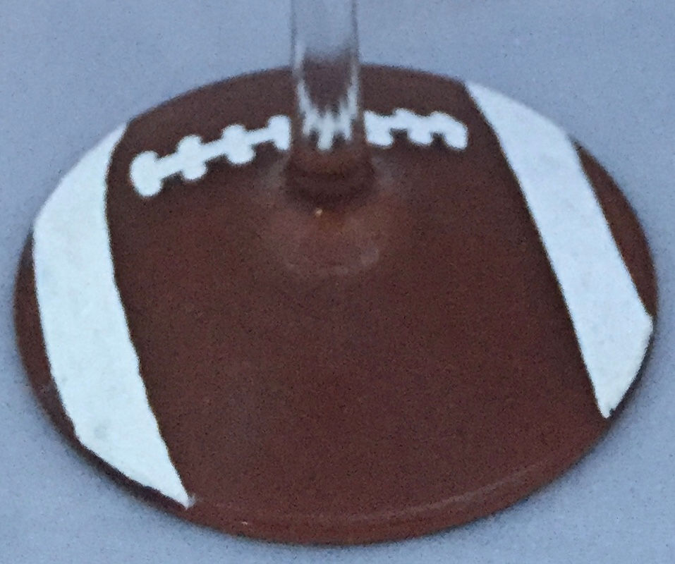 Thumbnail: Soccer Mom football mom with ball on base