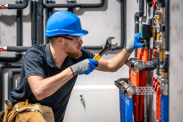 technician-checking-heating-system-boiler-room.jpg