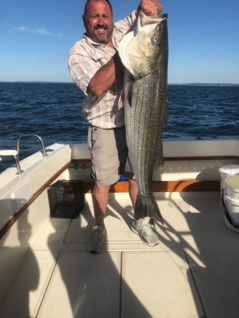 Greg with Huge Bass Caught with RS-901 in the LI Sound Spring Run.jpg