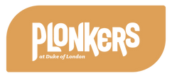 Plonkers-LogoAssets-Vers1-0_Primary-Landscape-Tagline-Reversed (Mustard).png