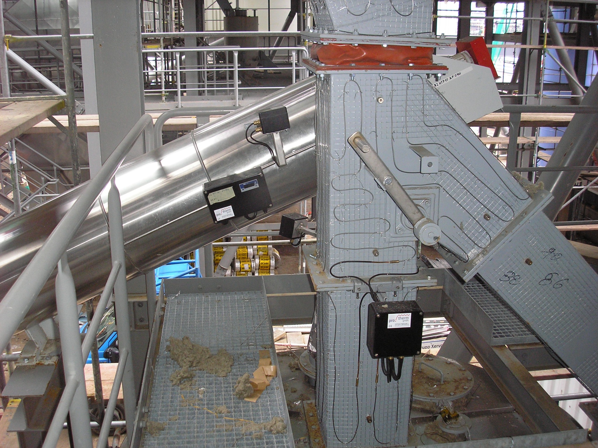 Heat tracing for a drop chute – Pro Therm, 2004