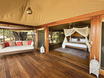 Larsen's camp double bed room and balcony taken during the day, used during our Samburu wildlife photography tours with Mark A Fernley