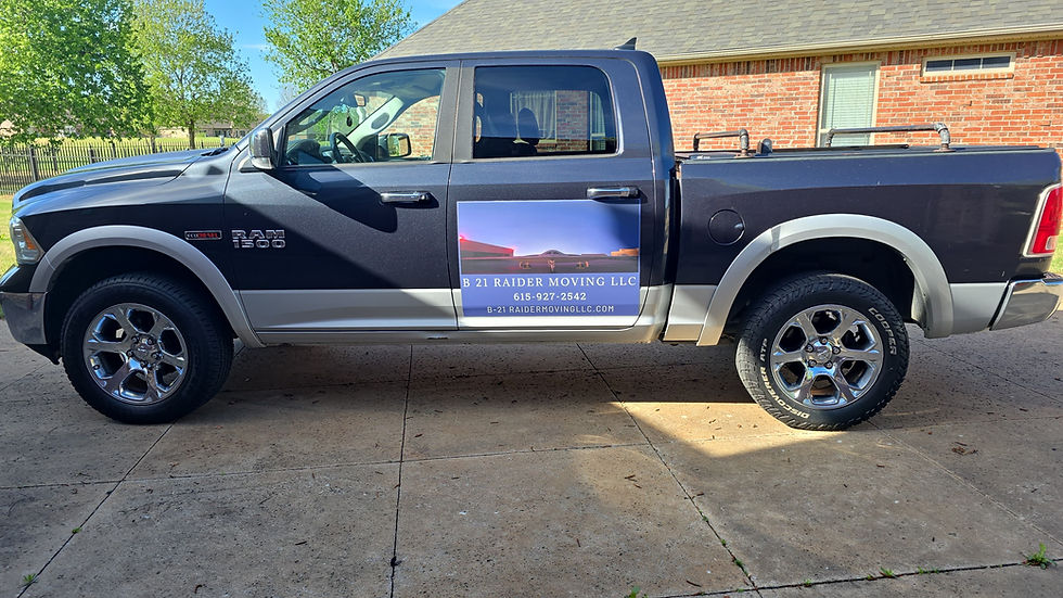 Dark gray pickup truck with magnet for local moving services