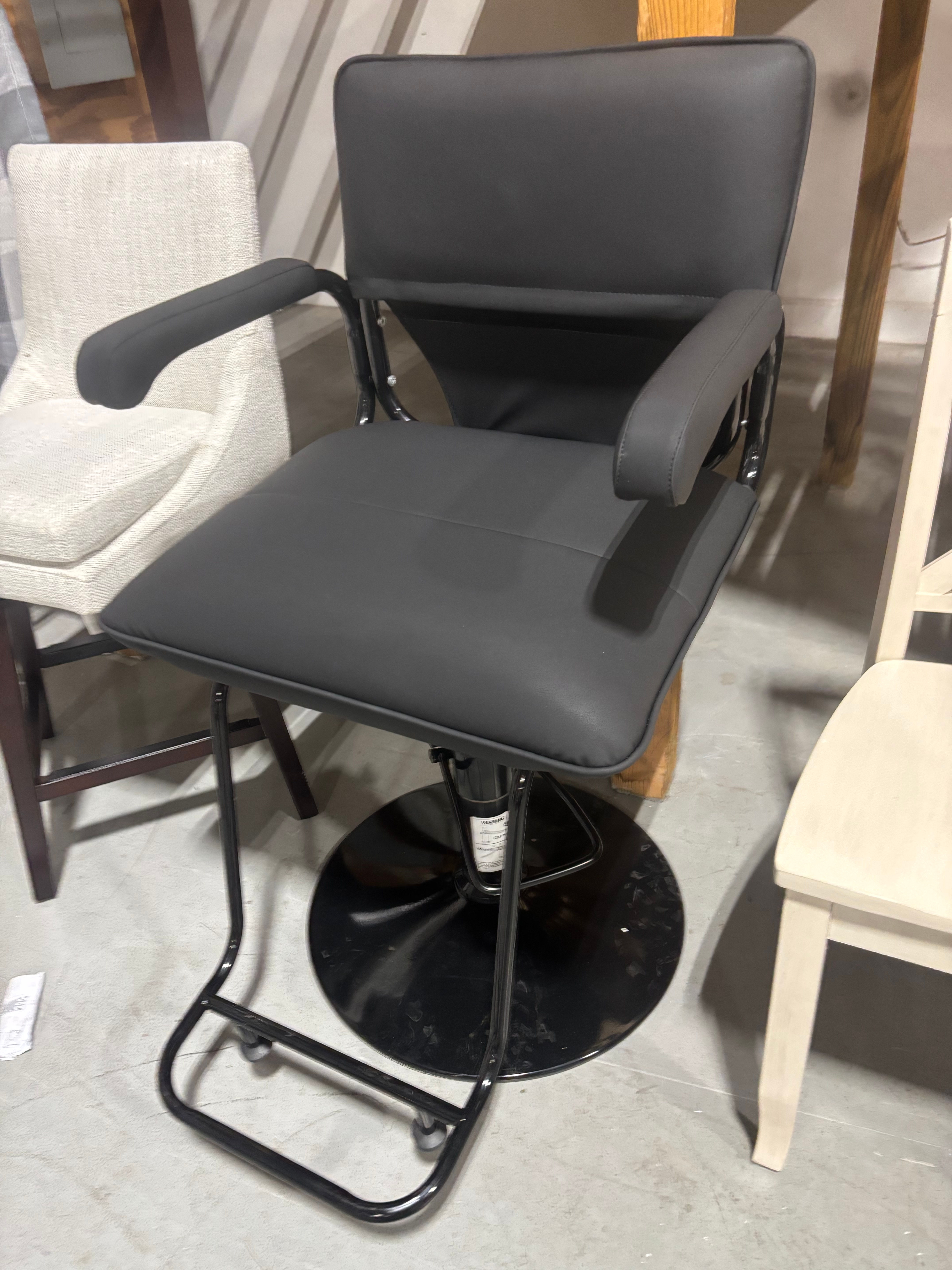Black leather barbers chair
