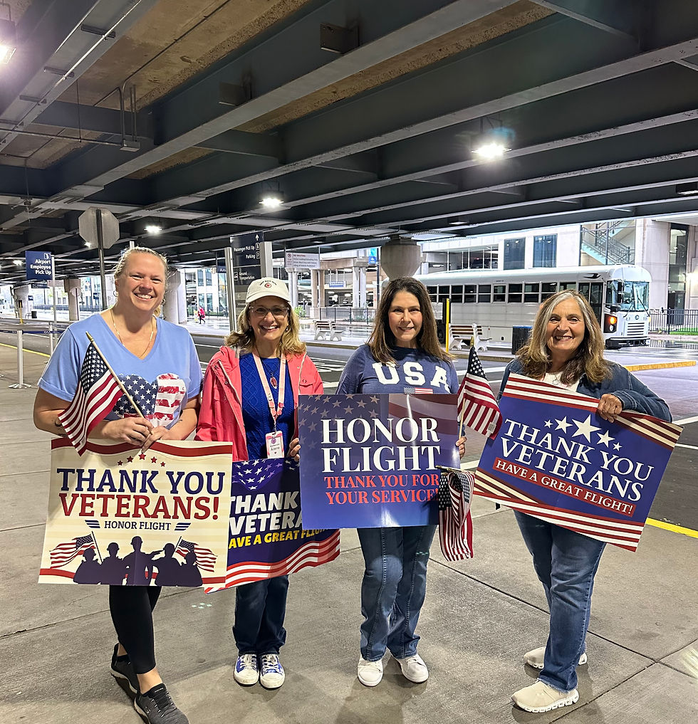 Give Back Girls cheering on veterans at honor flight Connecticut at Bradley Airport