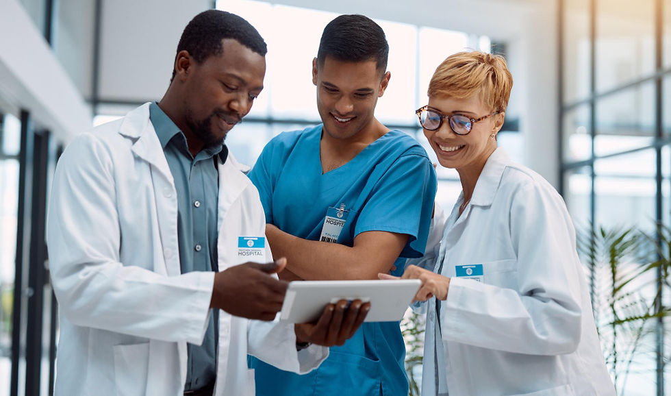Medical team in a Caribbean healthcare system using a tablet