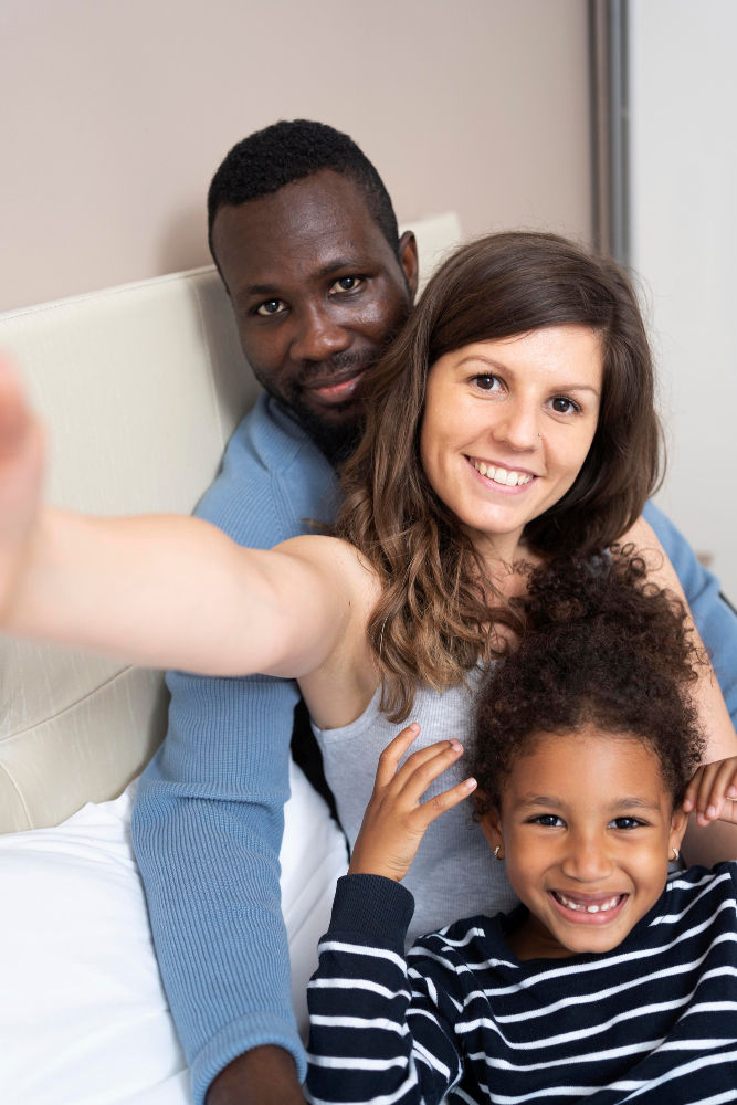 Family smiling with Caribbean healthcare system support