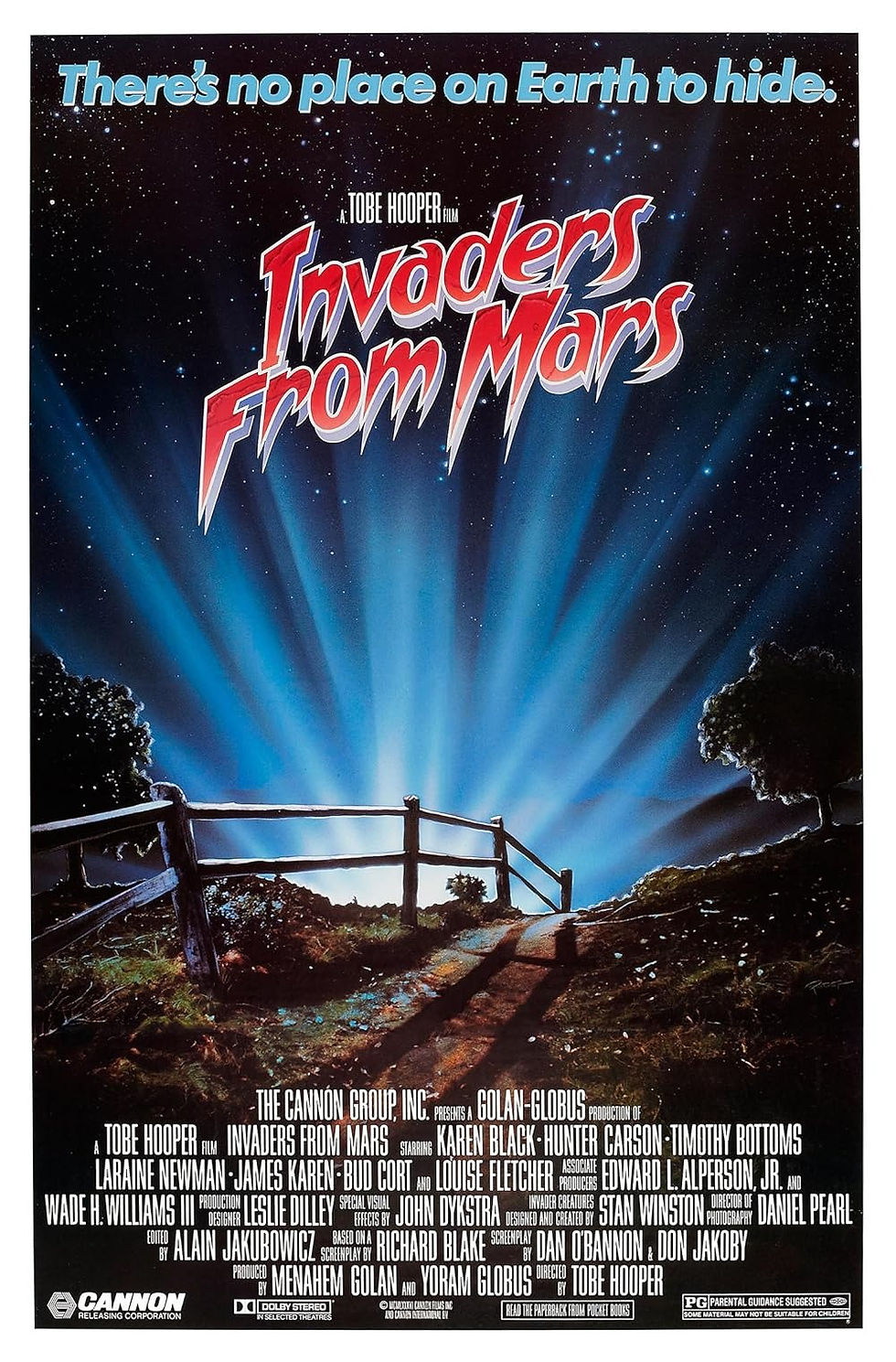 Movie poster of 'Invaders from Mars' showing a cosmic beam shining over a rural fence, with a starry sky backdrop.
