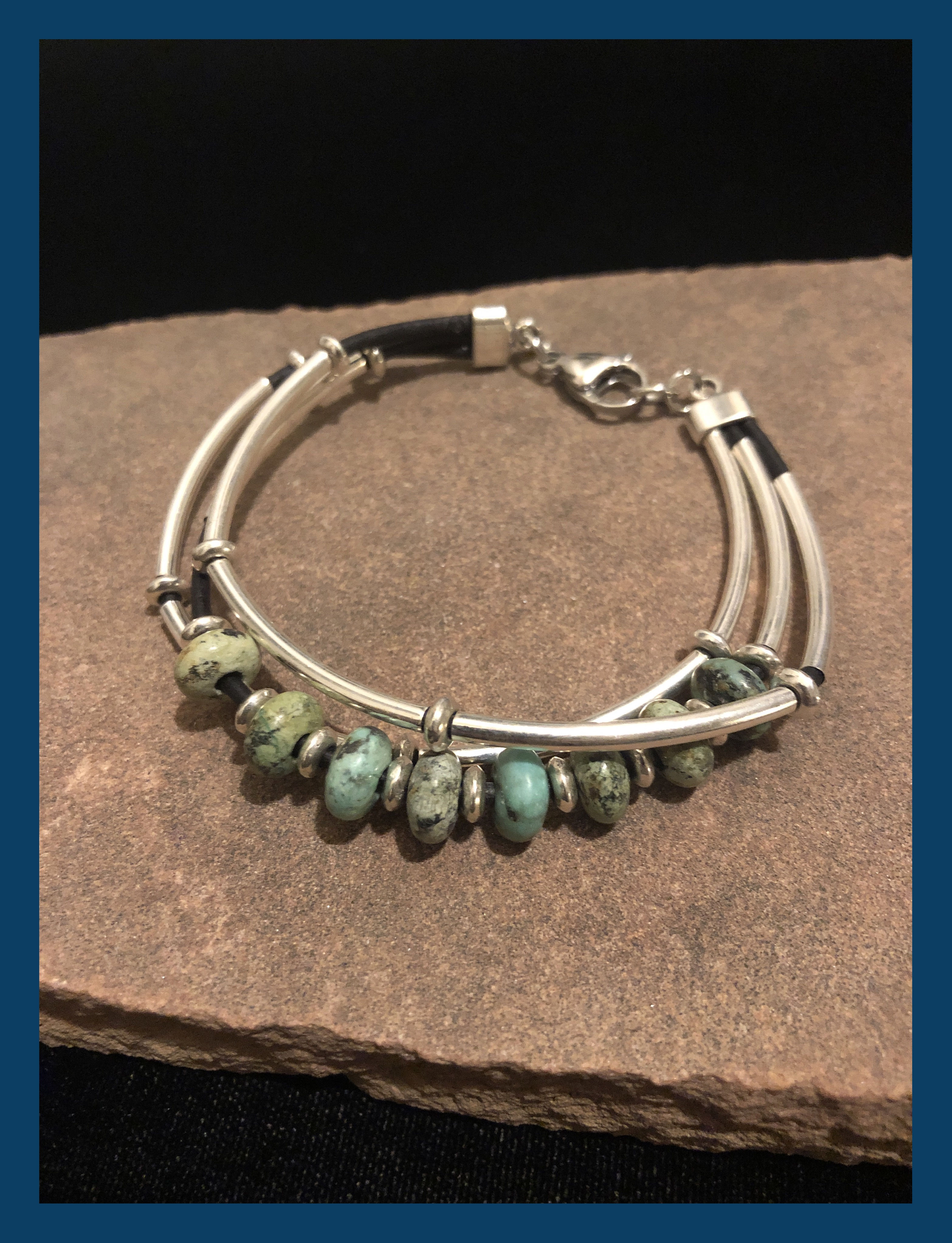 TRIPLE STRAND TURQUOISE LEATHER BRACELET 
