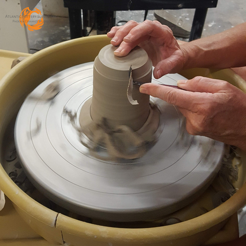 trimming on pottery wheel