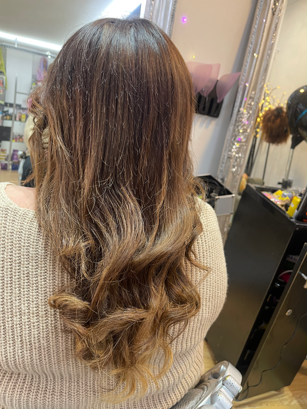 Tape extensions with styling after angled view at Eestelia Hair Salon Dalkeith Edinburgh — tape extensions styled result